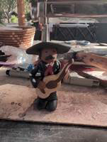 Sculpture of a Mariachi guitar player